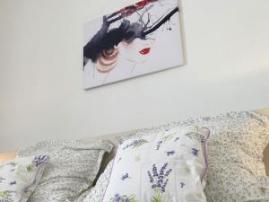 Posteľ alebo postele v izbe v ubytovaní Villy City Apartment