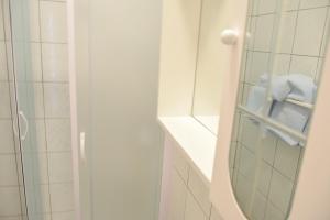 Kúpeľňa v ubytovaní Villy City Apartment