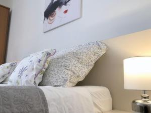 Posteľ alebo postele v izbe v ubytovaní Villy City Apartment