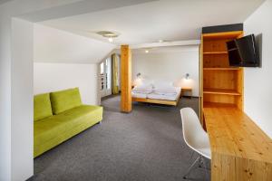 Hirschen Guesthouse - Village Hotel客房内的一张或多张床位
