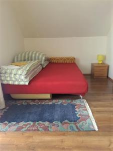 Łóżko lub łóżka w pokoju w obiekcie Pokoje i Apartamenty u Anny