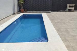 Bazén v ubytovaní Apartamentos NayDa Gran casa con piscina alebo v jeho blízkosti