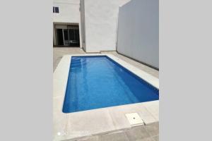 Bazén v ubytovaní Apartamentos NayDa Gran casa con piscina alebo v jeho blízkosti