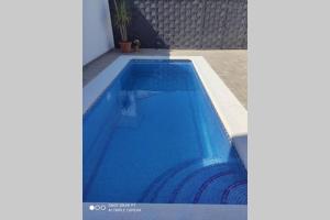 Bazén v ubytovaní Apartamentos NayDa Gran casa con piscina alebo v jeho blízkosti