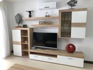 Televízia a/alebo spoločenská miestnosť v ubytovaní Al paraiso del sur