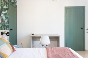 Postel nebo postele na pokoji v ubytování 4U Miranda - Adults Only