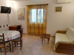 TV a/nebo společenská místnost v ubytování Apartment Sandra
