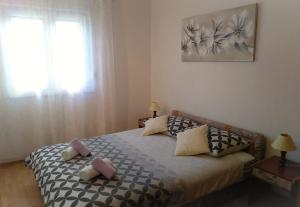 Postel nebo postele na pokoji v ubytování Apartment Sandra