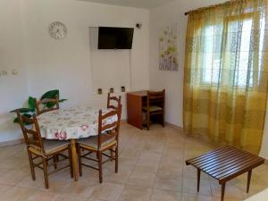TV a/nebo společenská místnost v ubytování Apartment Sandra + 1 fotografie