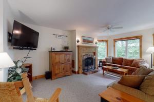 A television and/or entertainment centre at Jay Peak Village Homes
