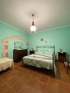 เตียงในห้องที่ Casa Cossu