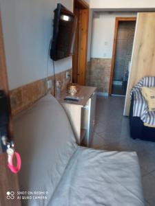 Televízia a/alebo spoločenská miestnosť v ubytovaní Annas apartment
