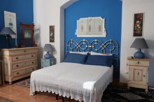 Postel nebo postele na pokoji v ubytování Il Trullo del Cadetto + 55 fotografií