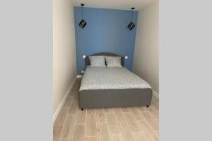 Кровать или кровати в номере Appartement très spacieux & Coupery