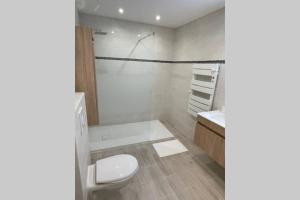 Koupelna v ubytování Appartement très spacieux & Coupery