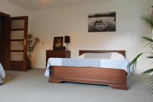 Postel nebo postele na pokoji v ubytování Krásný apartmán v bráně Lužických hor