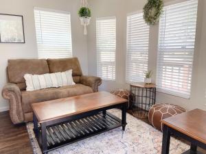 a living room with a couch and a coffee table at Lazy Z Resort in Twain Harte