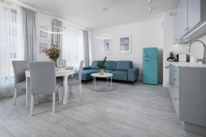 Kuchyňa alebo kuchynka v ubytovaní Apartament Pastelowa Portova