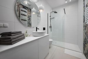 Kúpeľňa v ubytovaní Apartament Pastelowa Portova