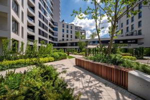 Vonkajšia záhrada v ubytovaní Apartament Pastelowa Portova