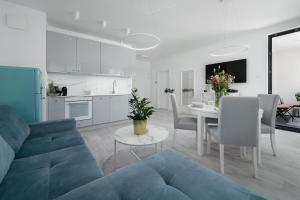 Kuchyňa alebo kuchynka v ubytovaní Apartament Pastelowa Portova