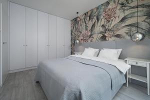 Posteľ alebo postele v izbe v ubytovaní Apartament Pastelowa Portova + 30 fotografií