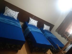 Postel nebo postele na pokoji v ubytování Cascais Quartos & Suítes