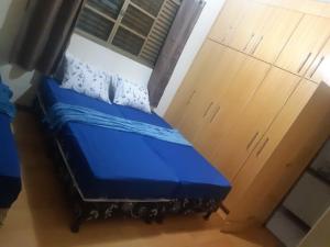 Postel nebo postele na pokoji v ubytování Cascais Quartos & Suítes