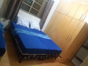 Postel nebo postele na pokoji v ubytování Cascais Quartos & Suítes