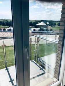 Ein Balkon oder eine Terrasse in der Unterkunft Golf Apartament 10