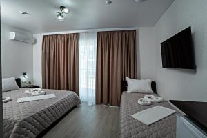 Letto o letti in una camera di Agata Breeze
