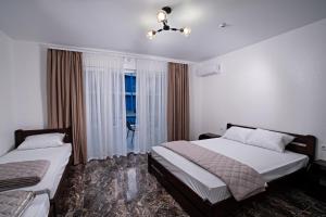 Letto o letti in una camera di Agata Breeze