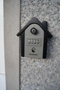 a black mailbox on the side of a building at Mountainview in Ballyward