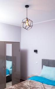 Postel nebo postele na pokoji v ubytování AlexandRos Home