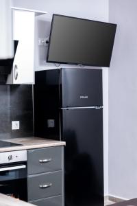 Kuchyň nebo kuchyňský kout v ubytování AlexandRos Home