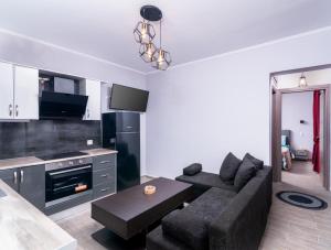 Kuchyň nebo kuchyňský kout v ubytování AlexandRos Home