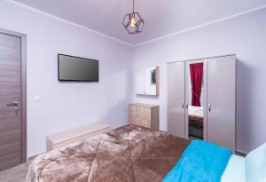Postel nebo postele na pokoji v ubytování AlexandRos Home