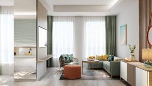 a living room with a couch and a table at Holiday Inn Resort Ho Tram Beach by IHG in Ho Tram