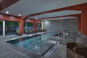Bazén v ubytování Omnia Hotel Relax & Wellness nebo v jeho okolí