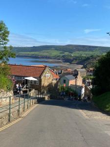 a small town with a view of a lake at Birtley House Bed and Breakfast in Robin Hood's Bay