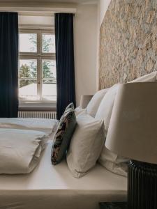 En eller flere senger på et rom på Pop-Up Lodge Wildbad Kreuth