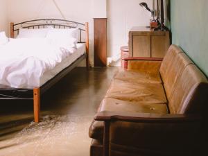 Кровать или кровати в номере Guesthouse Hitoyado