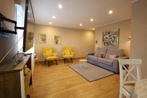 TV a/nebo společenská místnost v ubytování Apartamento Oviedo Foncalada