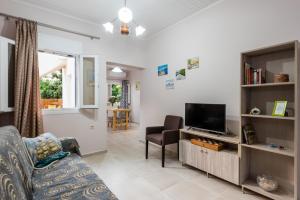 TV a/nebo společenská místnost v ubytování Gina’s House Argostoli