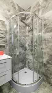 Ванная комната в Maya's Flats & Resorts 36 - Walowa 25