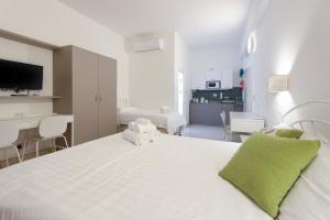 Letto o letti in una camera di Ta Gianni Guest House