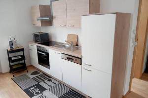Kuhinja oz. manjša kuhinja v nastanitvi Gemütliches Apartment in Landeck