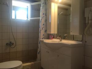 A bathroom at Nikolas Apartments Kalami bay