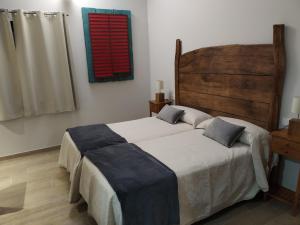 Postel nebo postele na pokoji v ubytování CASA SARTZALETA-Navarra-España