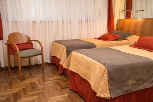 King David Flat Hotel - Argentina客房内的一张或多张床位
